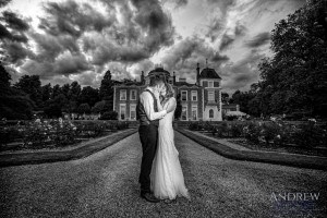 Oxon Hoath wedding Couple in front of Oxon hoath wedding venue Andrew Moore Photography