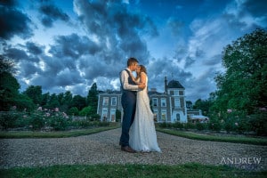 Oxon Hoath wedding couple in front of oxon hoath Andrew Moore Photography